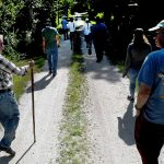 Keith Morton leads a group that includes three Pokanoket Tribe members to Margaret's Cave